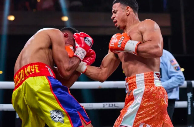 Referee Tony Weeks stops the fight allowing Rolando Romero to claim a TKO victory over Barroso to become the new WBA Super Lightweight champ in controversial fashion in Las Vegas. Photo Credit: Showtime Boxing