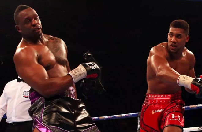 Joshua stopped Whyte in seven rounds in 2015 Photo Credit: PA
