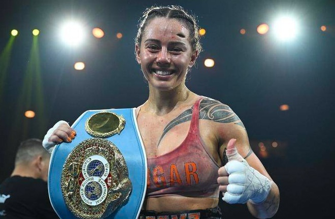 Johnson makes the second defence of her IBF super bantamweight world title against Scotney Photo Credit: James Ross/AAP PHOTOS