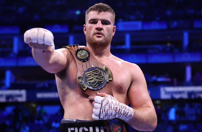 Fisher celebrates after stopping Armstrong to win the Southern Area heavyweight title Photo: Mark Robinson/Matchroom Boxing