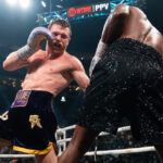 Canelo dropped Charlo in the seventh round Photo Credit: Ryan Hafey/Premier Boxing Champions