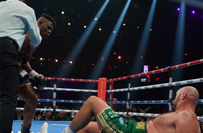 Fury hits the canvas against Ngannou Credit: Stephen Dunkley/Queensberry Promotions