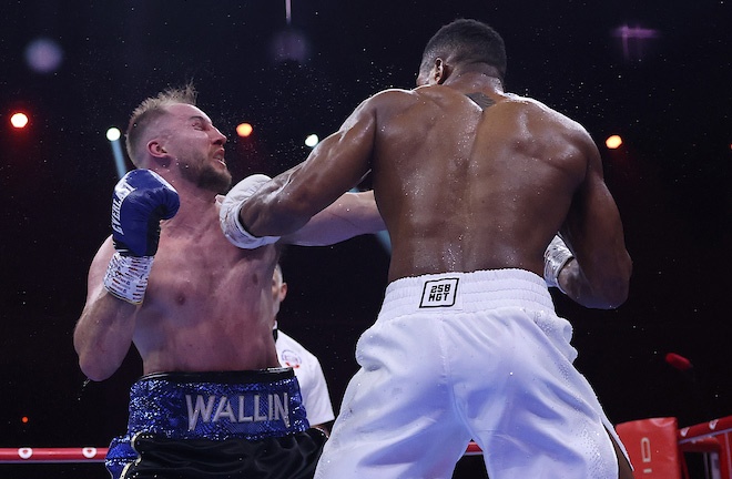 Joshua dominated Wallin before he was pulled out Photo Credit: Mark Robinson/Matchroom Boxing