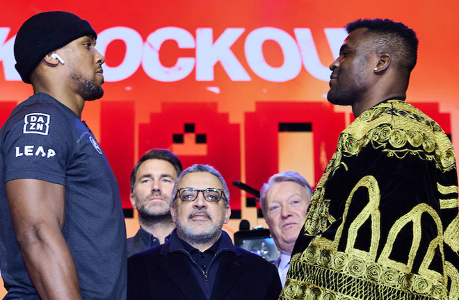 Joshua and Ngannou face-to-face ahead of their clash on March 8 in Saudi Arabia Photo Credit: Mark Robinson/Matchroom Boxing