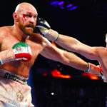Fury overcame a severe cut to beat Wallin in 2019 Photo Credit: Mikey Williams/Top Rank