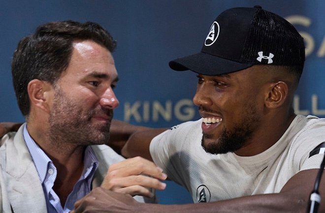 Hearn consoles Joshua after his rematch defeat to Usyk in 2022 Photo Credit: Mark Robinson/Matchroom Boxing