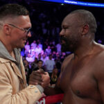 Usyk congratulated Chisora after his victory over Joyce Photo Credit: Stephen Dunkley/Queensberry