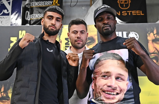 Azim and Davies face-to-face ahead of Saturday's showdown Photo Credit: BOXXER