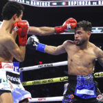 Espinoza beat Ramirez again to retain his WBO featherweight title Photo Credit: Mikey Williams/Top Rank