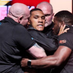 Benn was held back by security after Eubank Jr slammed an egg in his face Photo Credit: Mark Robinson Matchroom Boxing