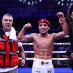 Murodjon Akhmadaliev celebrates after his victory over Luis Castillo Photo Credit: Melina Pizano/ Matchroom