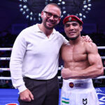 Murodjon Akhmadaliev with Matchroom ceo Frank Smith after 6th round stoppage of Luis Castillo