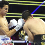 Espinoza was ruthless in defending his WBO featherweight world title Photo Credit: Mikey Williams/Top Rank