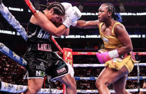 Claressa Shields unloads a right hand on Lani Daniels during their undisputed heavyweight title clash at Little Caesars Arena in Detroit. Shields dominated en route to a unanimous decision victory.