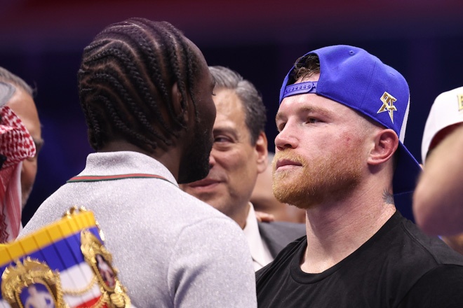 Canelo Alvarez and Terence Crawford faced off after Canelo beat William Scull credit: Leigh Dawney/ Queensberry