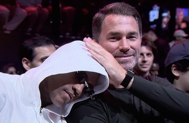 Benn sleeps on Hearn's shoulder during Haney's victory
