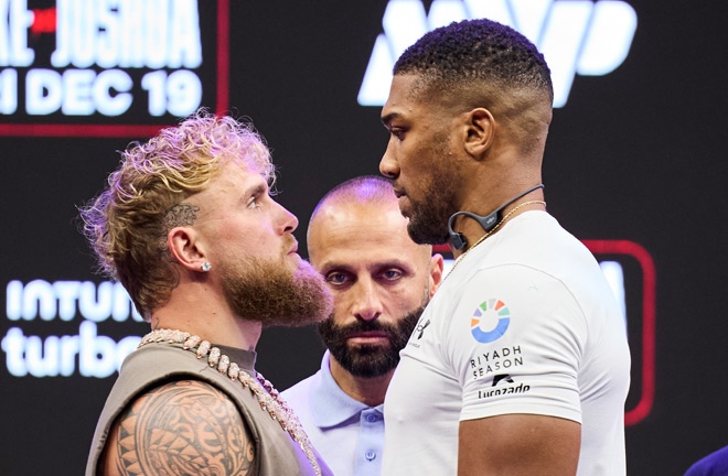 Jake Paul and Anthony Joshua face-to-face Photo Credit: Esther Lin/MVP