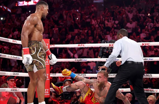 Jake Paul is knocked down in the sixth round by Anthony Joshua during a heavyweight fight at the Kaseya Center on December 19, 2025 in Miami, Florida, United States. (Photo: Getty Images for Netflix)