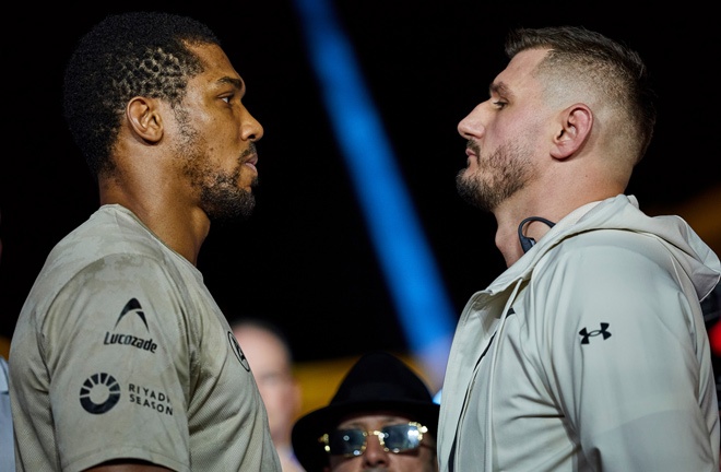 Joshua and Prenga face-to-face at Thursday's press conference in Jeddah Photo Credit: Mark Robinson Matchroom Boxing