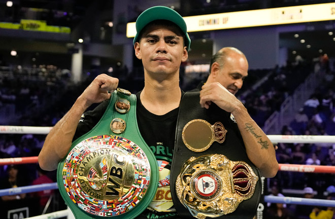 Mendoza stopped Sandoval to become unified WBC and WBA flyweight world champion Photo Credit: Golden Boy Promotions